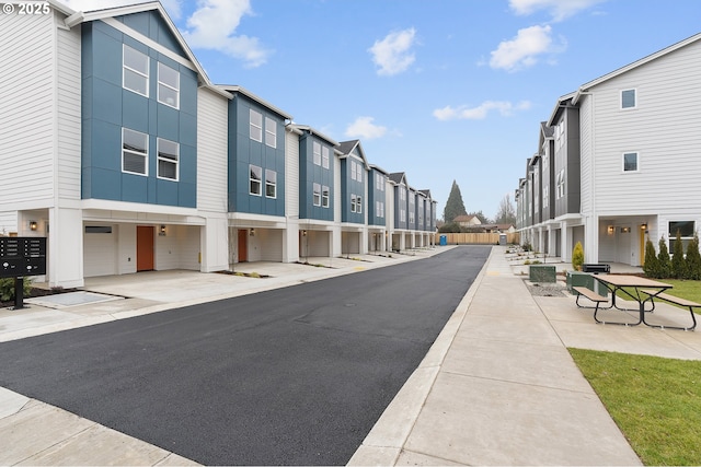 view of street featuring a residential view and sidewalks