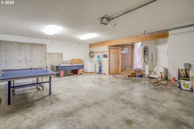 5020 NW Lee Ave, Lincoln City, OR 97367 - garage featuring washer / dryer and a garage door opener