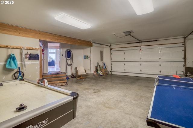 5020 NW Lee Ave, Lincoln City, OR 97367 - garage featuring electric panel and a garage door opener