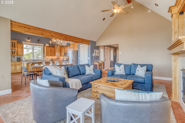 5020 NW Lee Ave, Lincoln City, OR 97367 - living area featuring a chandelier, ceiling fan, high vaulted ceiling, light tile patterned floors, and a fireplace