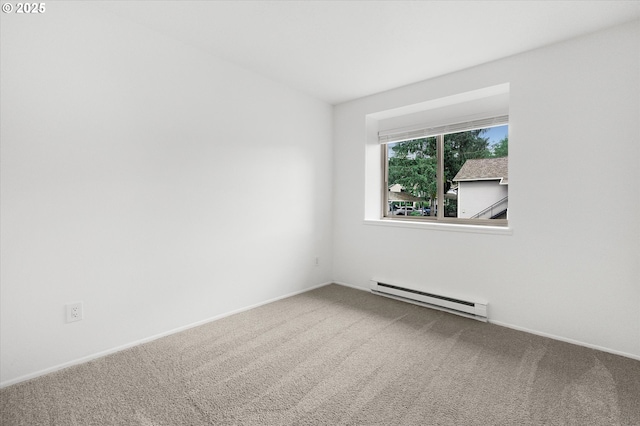 86 Kingsgate Rd Unit D204, Lake Oswego, OR 97035 - carpeted spare room with baseboard heating and baseboards