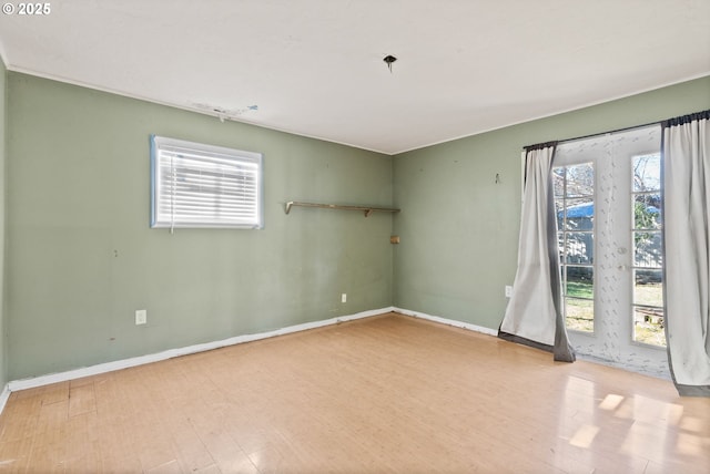 empty room with light wood-type flooring