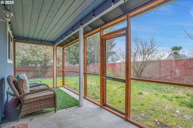 sunroom with wooden ceiling