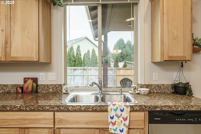 kitchen featuring sink, stainless steel dishwasher, and light brown cabinets