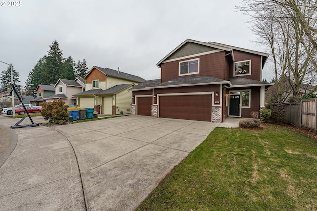 craftsman-style house with a garage and a front yard