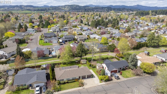 drone / aerial view featuring a mountain view and a residential view