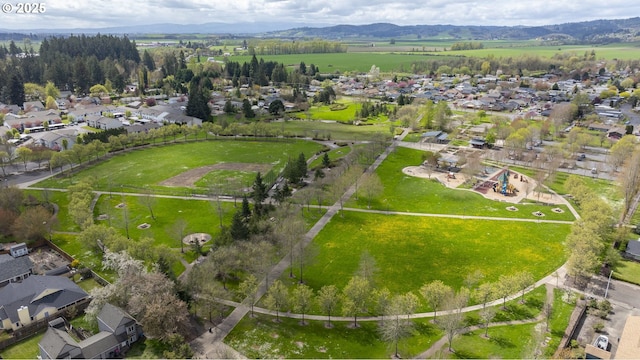 birds eye view of property featuring a residential view and a mountain view