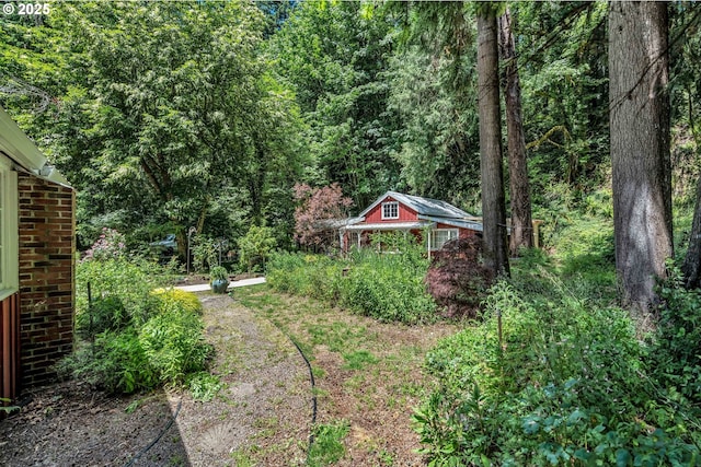 63645 E Barlow Trail Rd, Brightwood, OR 97011 - view of yard featuring a forest view and an outdoor structure