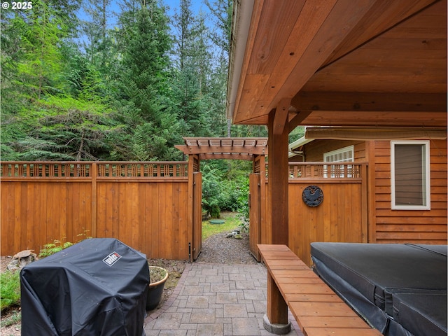 view of patio / terrace featuring fence and area for grilling