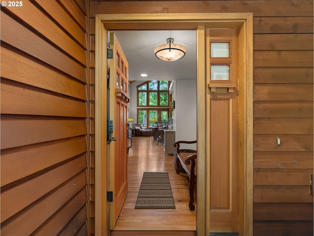 hallway with wood finished floors