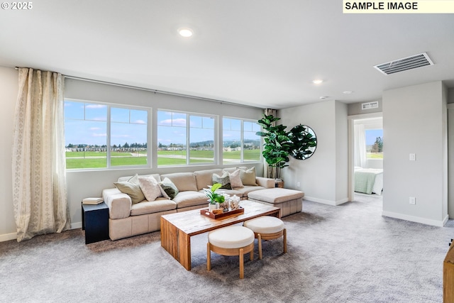 living room with carpet flooring, baseboards, and recessed lighting