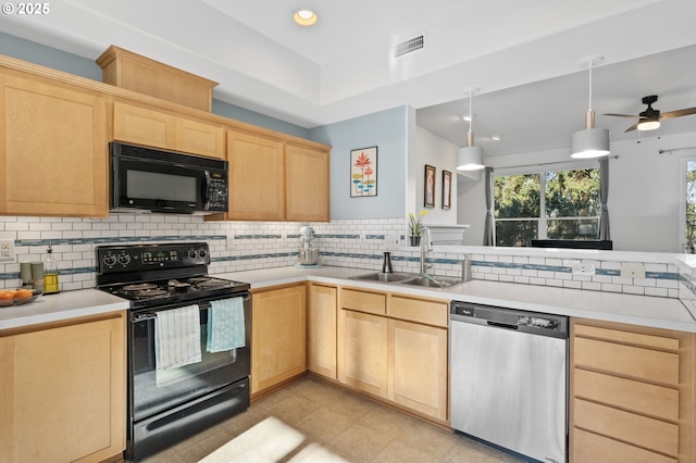 kitchen featuring hanging light fixtures, sink, light brown cabinets, and black appliances