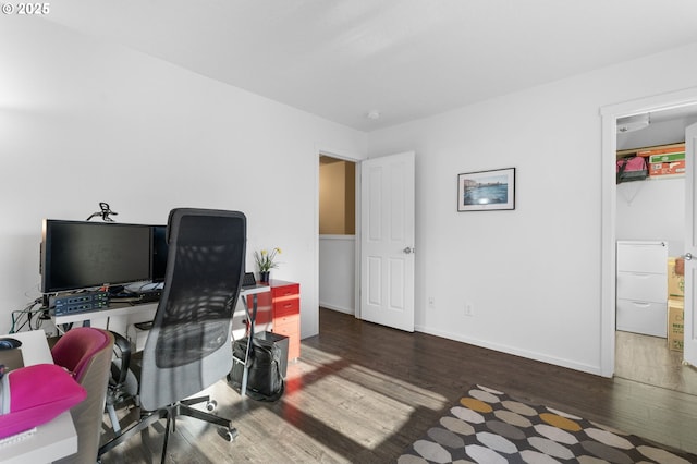 office space featuring dark wood-type flooring