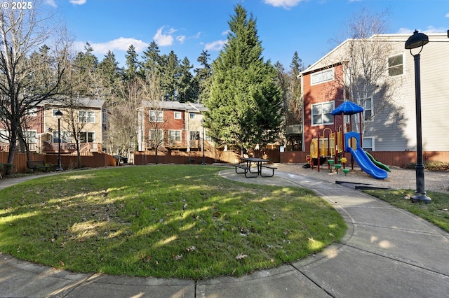 view of play area featuring a lawn