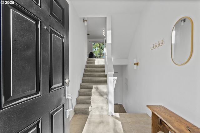 entrance foyer with light tile patterned floors