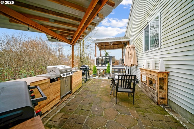 view of patio / terrace with area for grilling and exterior kitchen