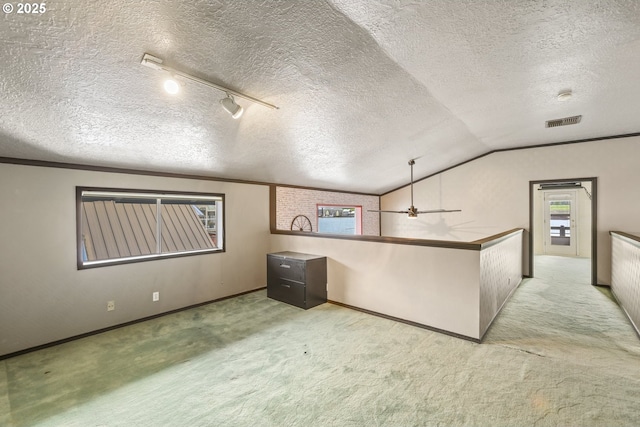 2039 N Jantzen Ave, Portland, OR 97217 - bonus room featuring a textured ceiling, carpet, visible vents, vaulted ceiling, and baseboards