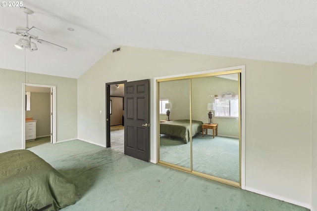2039 N Jantzen Ave, Portland, OR 97217 - bedroom with a closet, carpet floors, baseboards, ceiling fan, and vaulted ceiling
