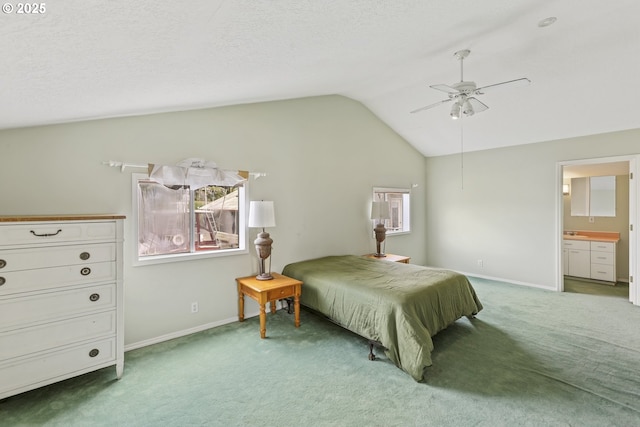 2039 N Jantzen Ave, Portland, OR 97217 - carpeted bedroom with lofted ceiling, baseboards, connected bathroom, and ceiling fan