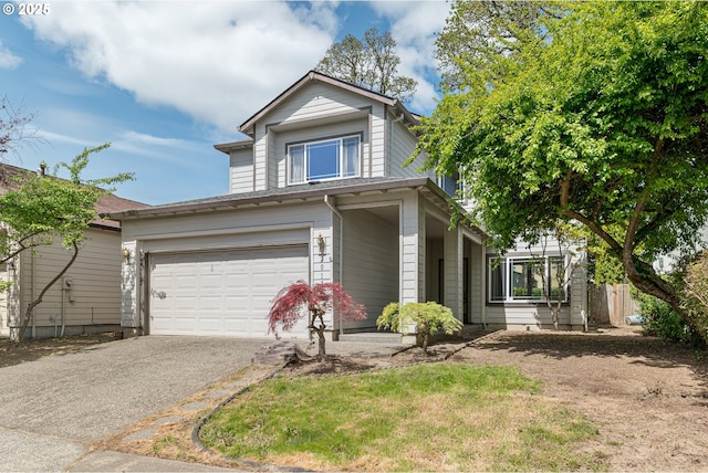 traditional-style house with fence and aphalt driveway