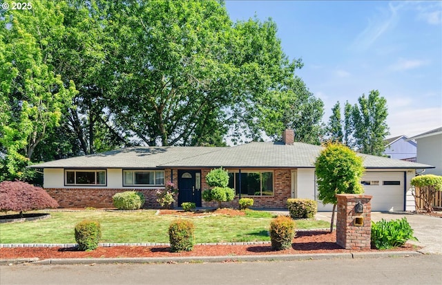 19555 SW Cascadia St, Beaverton, OR 97078 - single story home with brick siding, a garage, driveway, and a front yard