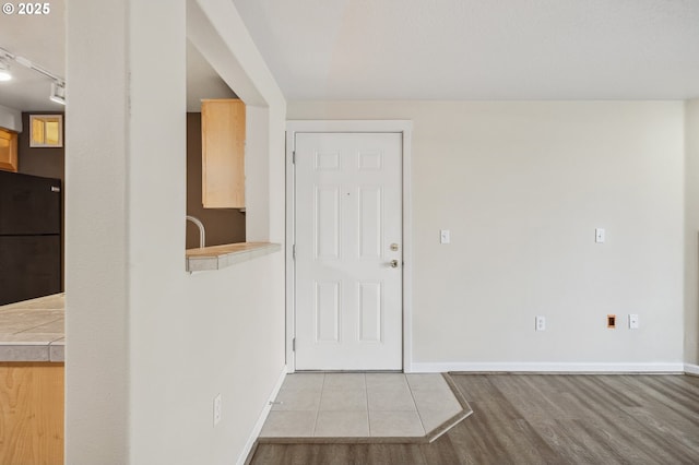 entrance foyer featuring light hardwood / wood-style floors