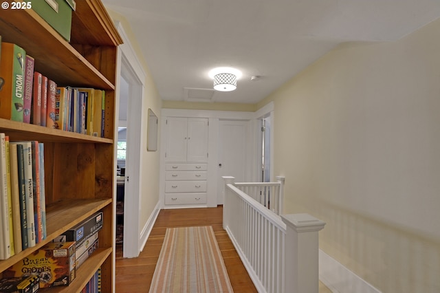 803 NE Laurelhurst Pl, Portland, OR 97232 - hallway featuring an upstairs landing, wood finished floors, and baseboards