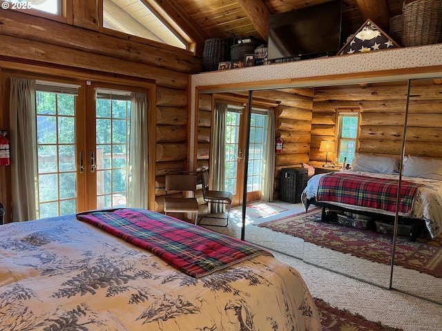 6715 Ivy St, Springfield, OR 97478 - bedroom with an AC wall unit, rustic walls, carpet flooring, beam ceiling, and wood ceiling