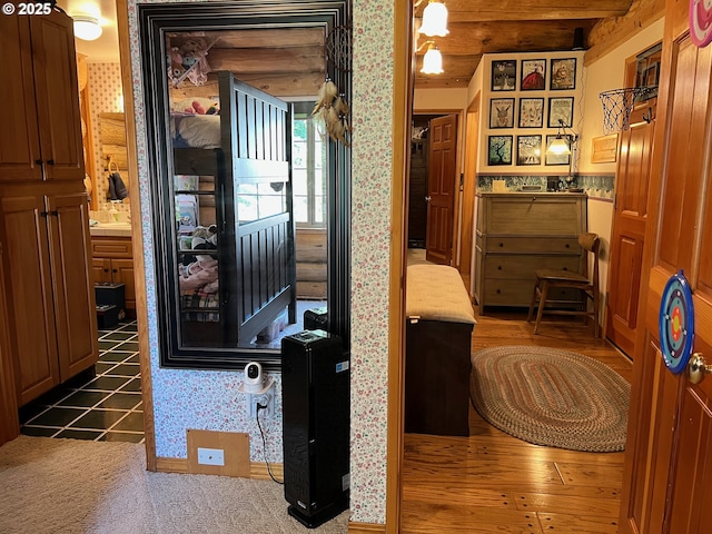 6715 Ivy St, Springfield, OR 97478 - corridor with wallpapered walls and wood finished floors