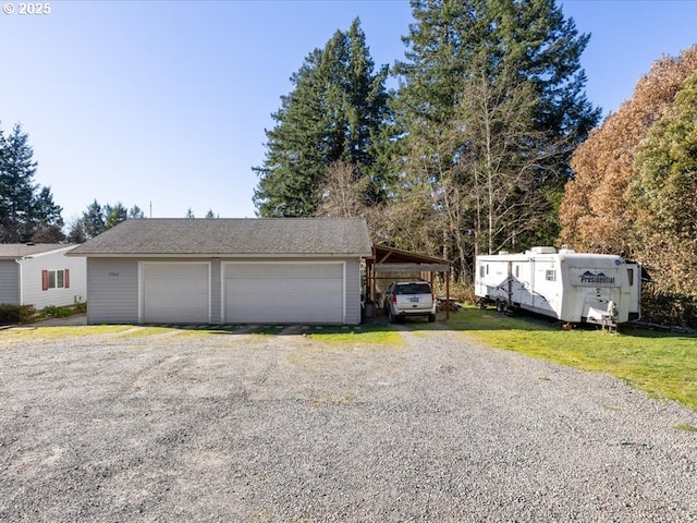 garage with a carport