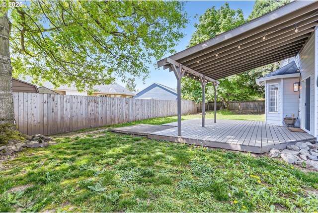 view of yard with a deck