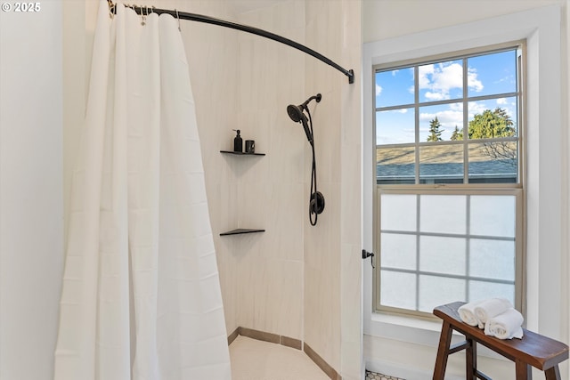 bathroom featuring curtained shower