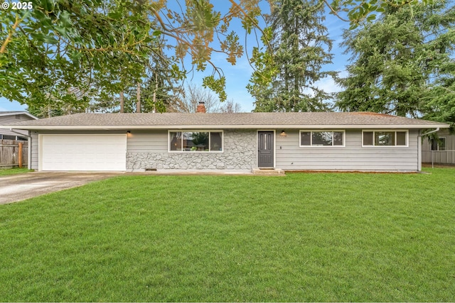 ranch-style house with a garage and a front yard