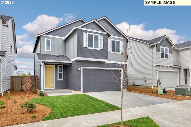4204 NE 186th St Lot 246, Vancouver, WA 98686 - view of front facade featuring a garage, concrete driveway, and board and batten siding
