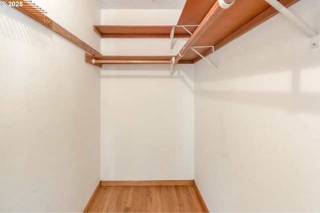 2110 SE 148th Pl, Portland, OR 97233 - walk in closet with wood finished floors