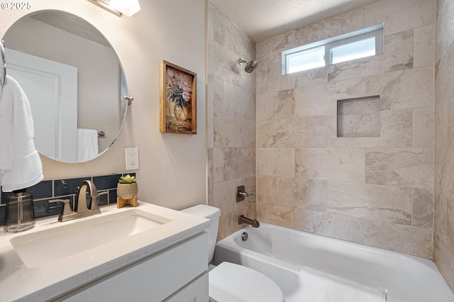full bath with toilet, shower / tub combination, and vanity