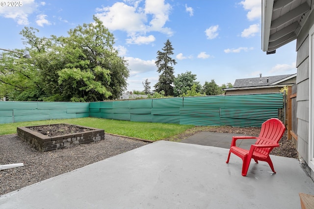 view of patio with a fenced backyard