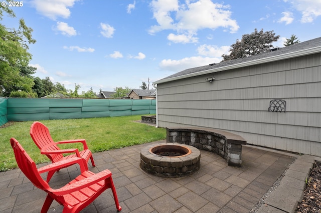 view of patio with an outdoor fire pit