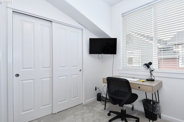 office area with baseboards and light carpet