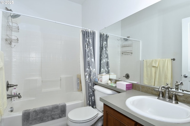 full bathroom featuring toilet, shower / bath combo, and vanity