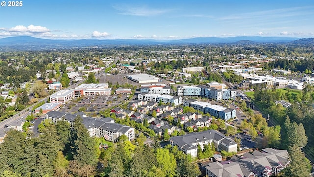 drone / aerial view featuring a mountain view