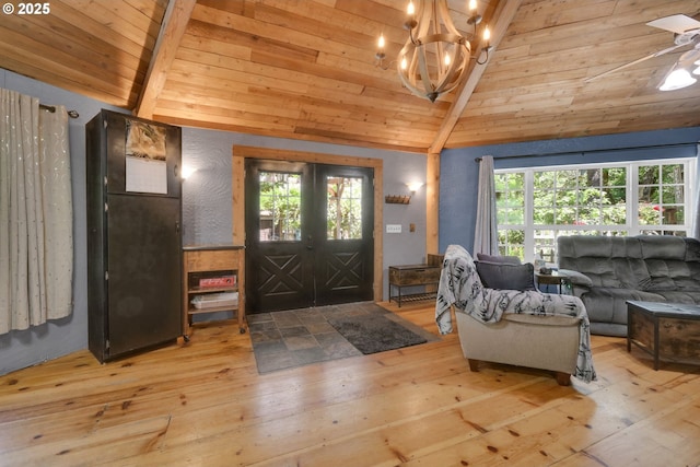 25761 Feather Dr, Veneta, OR 97487 - entryway with wood-type flooring, wood ceiling, a chandelier, ceiling fan, and french doors