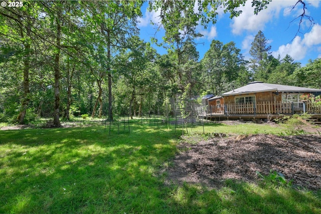 25761 Feather Dr, Veneta, OR 97487 - view of green lawn with a wooden deck