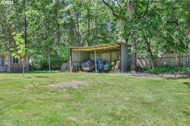 25761 Feather Dr, Veneta, OR 97487 - view of yard with an outdoor structure, a carport, and a pole building