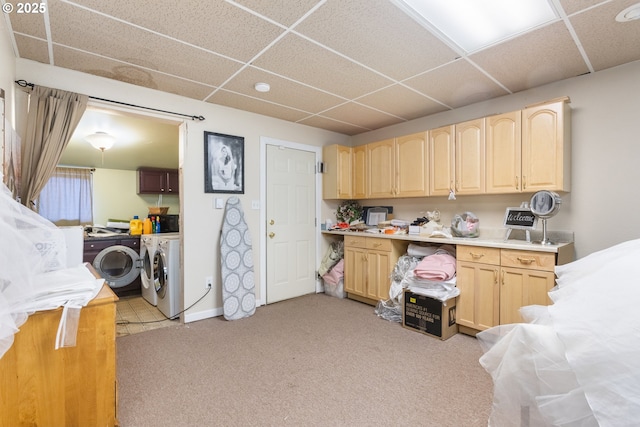 818 NE Division St, Gresham, OR 97030 - kitchen with light brown cabinetry, a drop ceiling, and washing machine and dryer