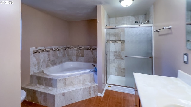 full bathroom with toilet, vanity, hardwood / wood-style floors, and shower with separate bathtub