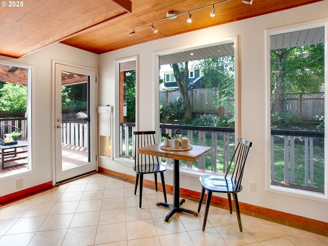 4214 NE Hassalo St, Portland, OR 97213 - sunroom featuring plenty of natural light and rail lighting