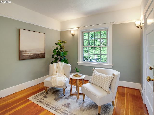 4214 NE Hassalo St, Portland, OR 97213 - sitting room featuring wood finished floors and baseboards