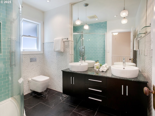 4214 NE Hassalo St, Portland, OR 97213 - full bath featuring tile walls, double vanity, a shower stall, and wainscoting