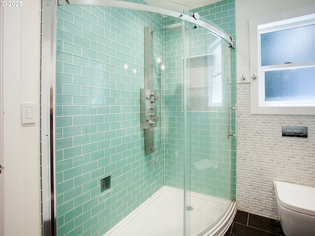4214 NE Hassalo St, Portland, OR 97213 - full bath with a stall shower and tile walls